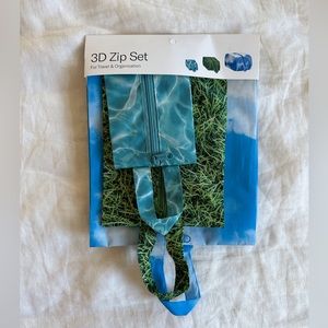 BAGGU 3D zip set in lawnscape. Brand new with tags. Recycled nylon.